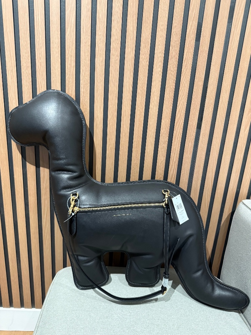 Coach dinosaur “Rexy” runway handbag